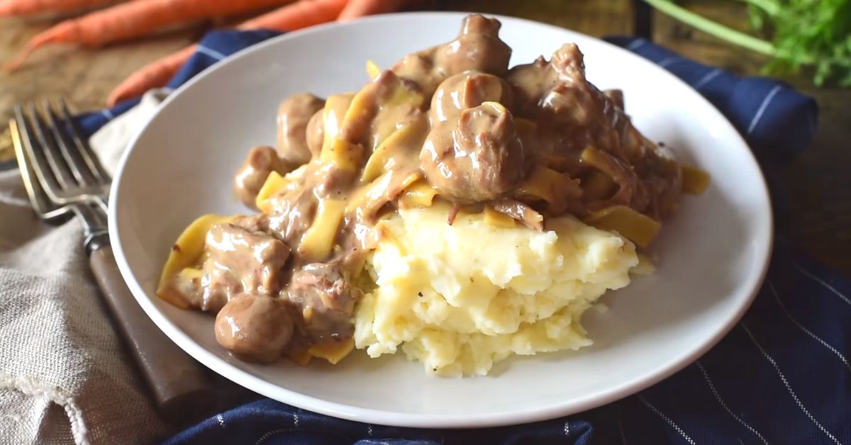 beef and noodles over mashed potatoes